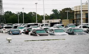 FILE PHOTO: A car dealership is covered by Hurricane Harvey floodwaters near Houston