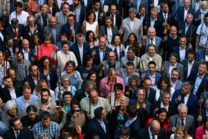 Mayors of towns of Catalonia that support the Referendum of 1-O raise up their scepters as they shout “we will vote” at Palau de la Generalitat in Barcelona