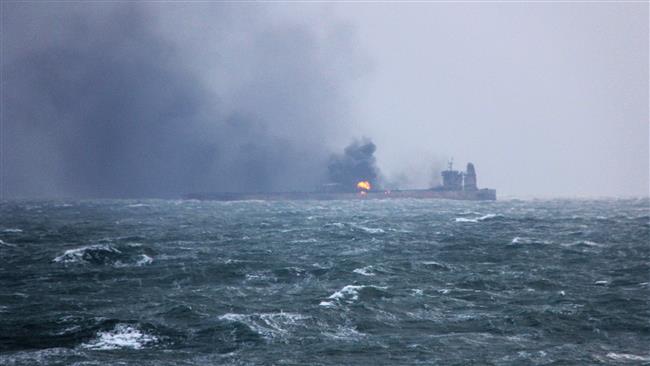 Oil tanker still ablaze, search for missing crew continues
