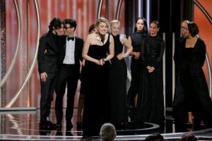 Greta Gerwig director of Lady Bird accepts the award for Best Motion Picture Comedy or Musical at the 75th Golden Globe Awards in Beverly Hills