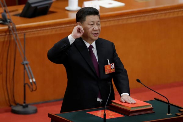 China’s parliament re-elects Xi Jinping as president