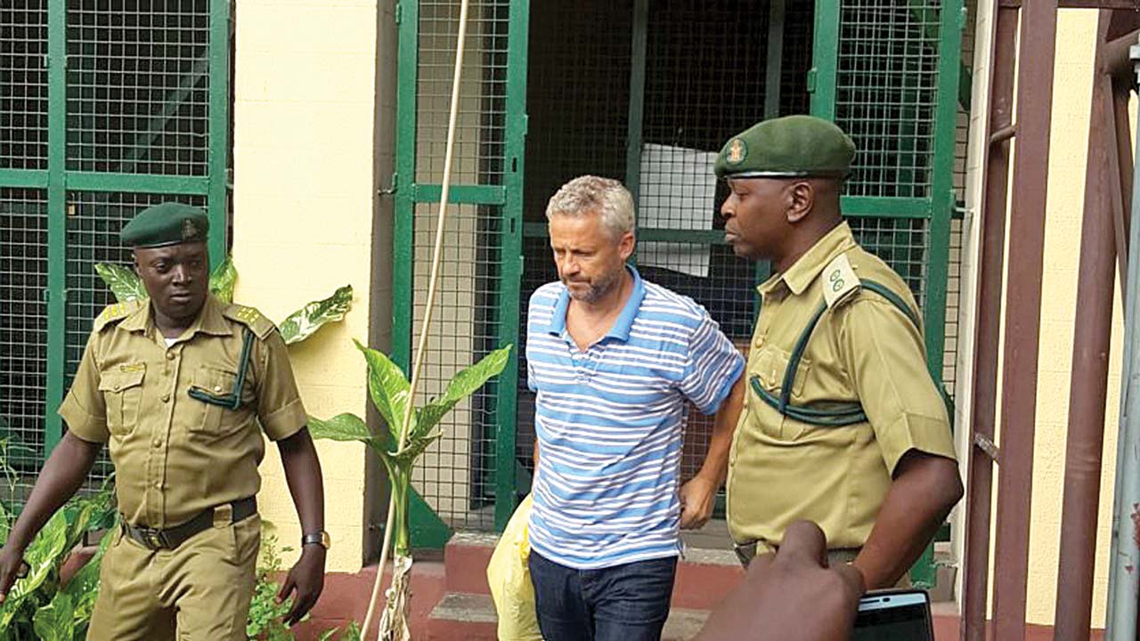 Danish man who murdered wife, daughter arraigned in court