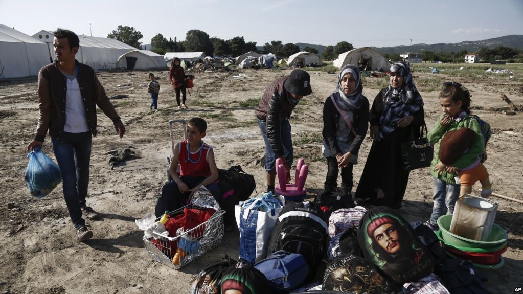 Refugees in Greece call for an end to conflict in Syria
