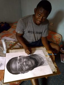 Eli-Waduba-working-on-the-drawing