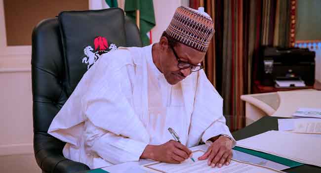 BREAKING: Buhari signs bill declaring June 12 Public holiday