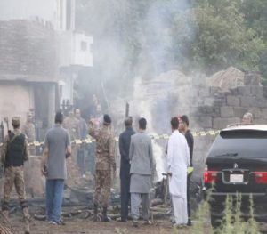 Pakistan army plane crashes into residential area killing at least 17 persons