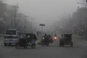 Indonesia haze: Thick smog from forest fires blanket roads, villages