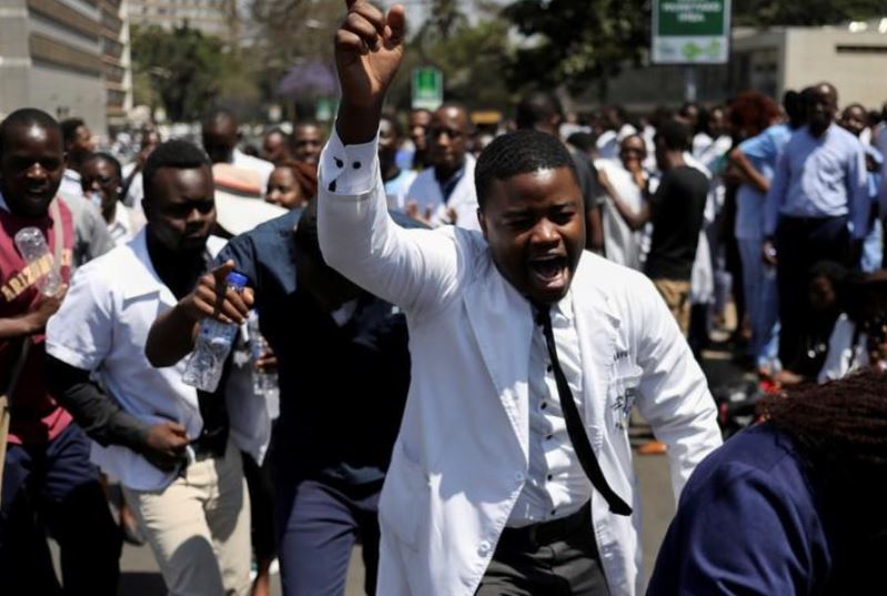 Zimbabwe fires 211 striking doctors as economy worsens