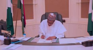 Buhari-signs-2
