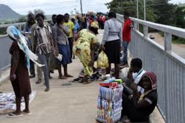 Hawkers take over Pedestrian Bridges in Abuja