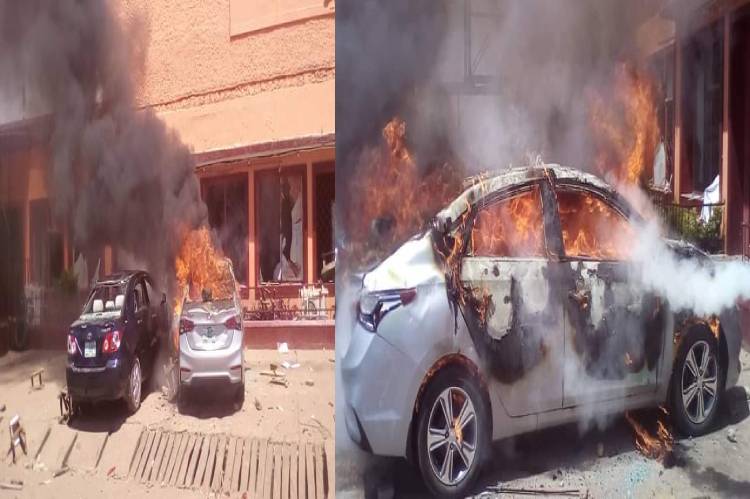 Photos: Vehicles set ablaze at Mr Biggs’ premises in Jos Terminus market