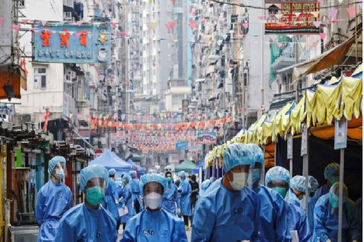 Hong Kong resort to ‘ambush lockdowns’ to fight virus outbreaks in high-density housing