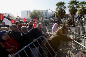 Hundreds of Tunisians protest president's power grab near suspended parliament