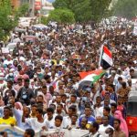 Sudan: Thousands of people march to presidential palace in protest against coup