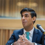 UK PM Sunak defends climate policy shift says efforts not slowing down