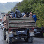 Thousands of ethnic Armenians flee Nagorno-Karabakh following region's defeat